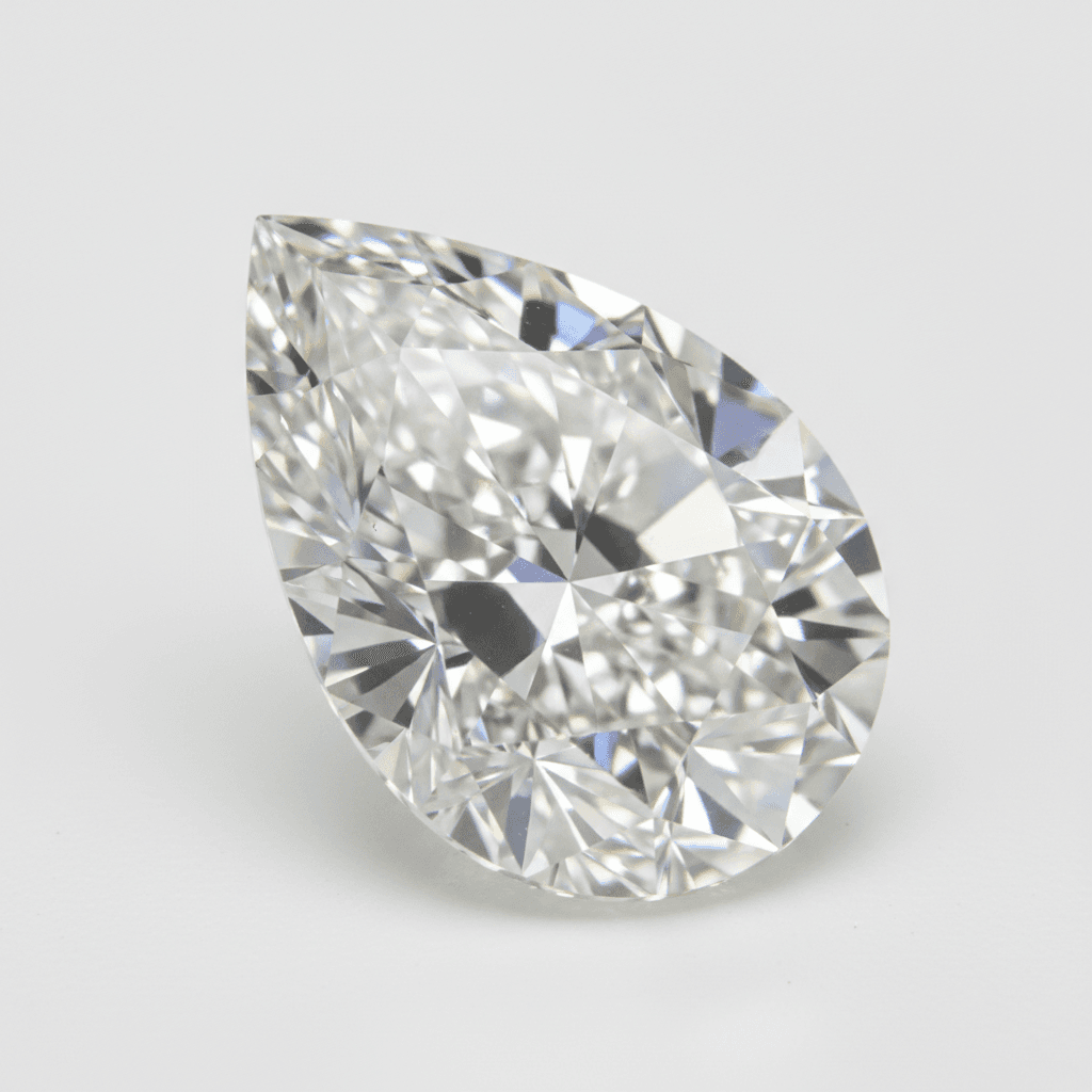 Loose pear-cut diamond with brilliant facets on a light grey background