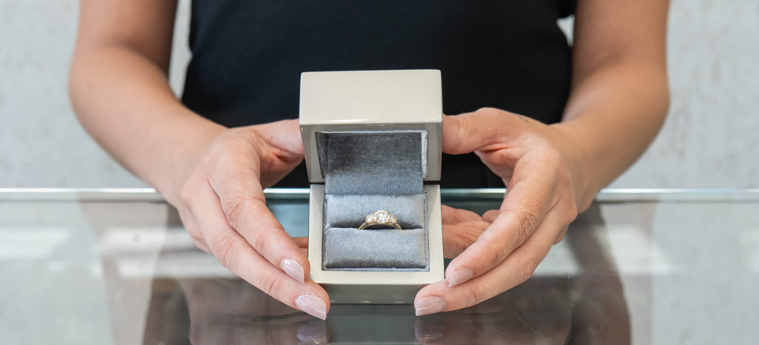 Alex Petrov examining jewelry at the workbench