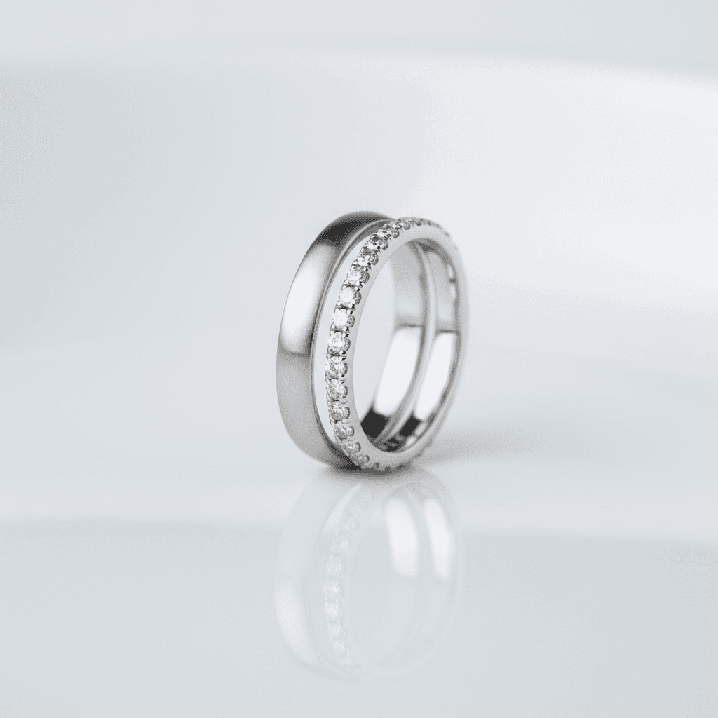 White gold ring with matte finish and pavé diamond eternity band stacked together